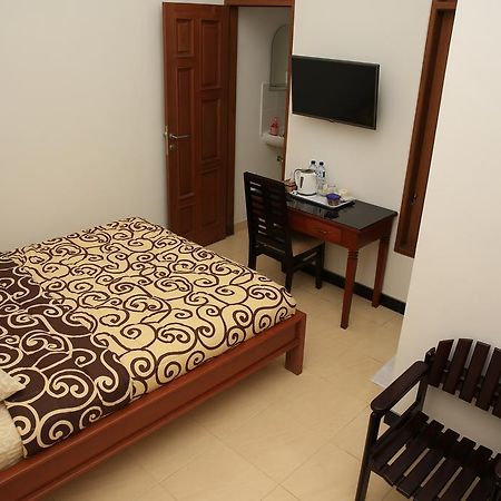 Puri Kusuma Guest House Табанан Номер фото