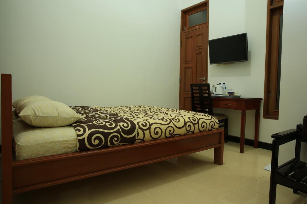 Puri Kusuma Guest House Табанан Номер фото